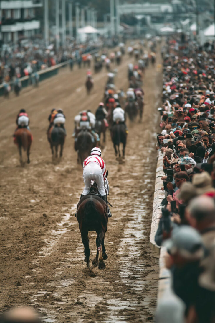 Exciting horse racing action at the hippodrome with jockeys in full gallop from a vantage point